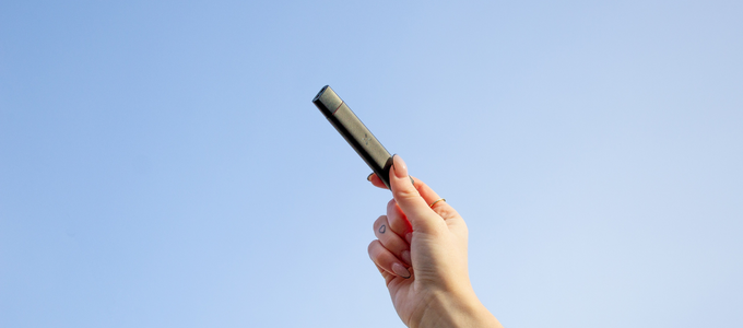 holding weed cartridge in air