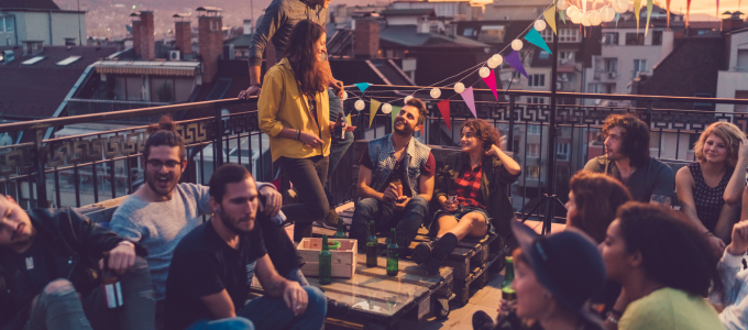 people socializing on rooftop