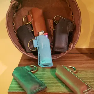 (each) Arnie Leather Lighter Cases $25